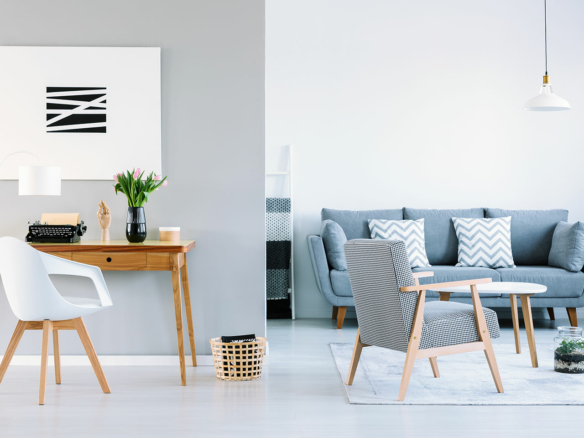 Stylish Ulcinj living room: grey sofa, chic decor, workspace—invest in Montenegro property with montenegro-listings.me by Ekosphere DOO.