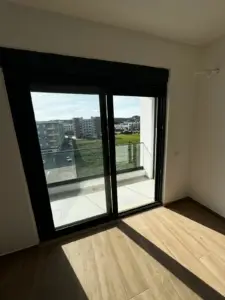 Spacious Ulcinj apartment: sunlit balcony, modern views, premium flooring—exclusive with montenegro-listings.me by ekosphere doo.