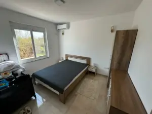 Modern Ulcinj bedroom: double bed, wardrobe, AC, views. Ideal Montenegro investment on montenegro-listings.me by ekosphere doo.