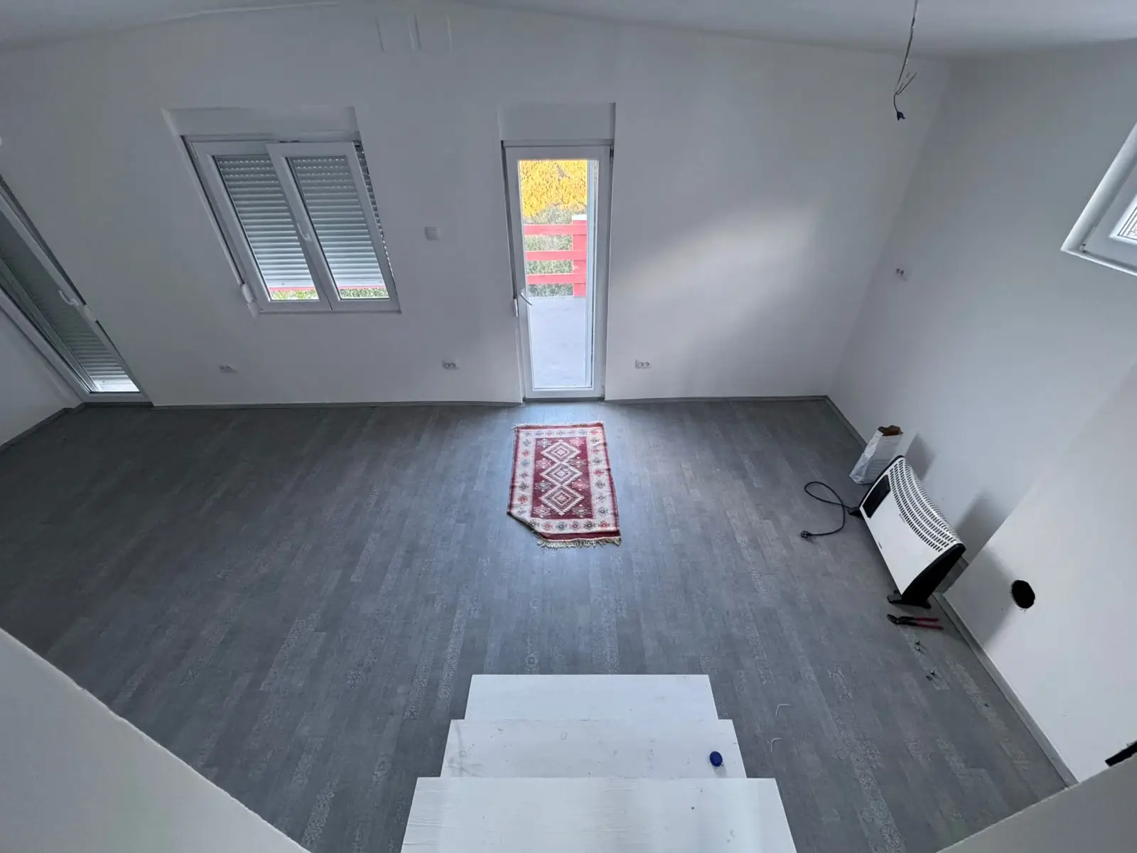 Spacious, bright Ulcinj property with gray floors, white walls & 3 windows. Exclusive listing by ekosphere doo on montenegro-listings.me.