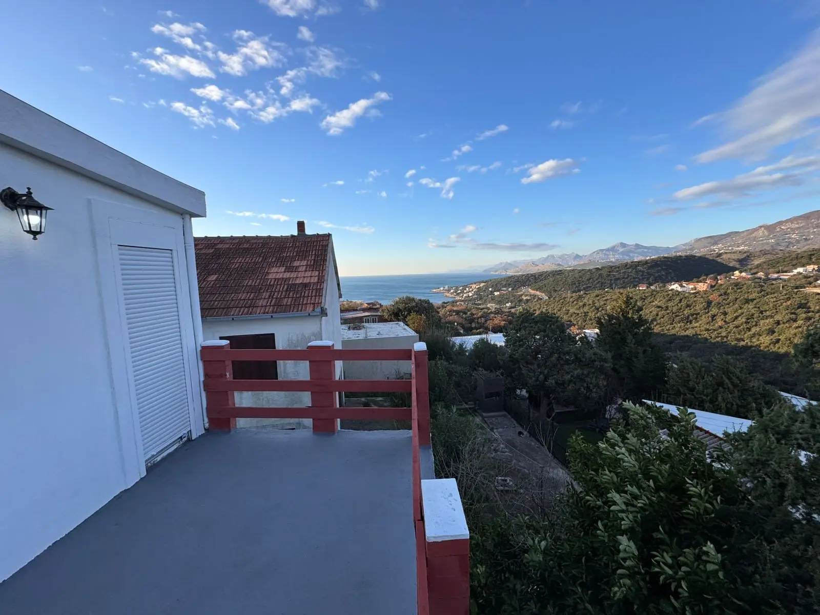Stunning balcony view in Ulcinj, Montenegro&mdash;lush hills, ocean vistas, and prime real estate. Exclusive at montenegro-listings.me by ekosphere doo.