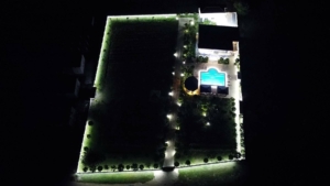 Stunning Ulcinj property—bright modern home, lit pool, manicured gardens; exclusive at montenegro-listings.me by ekosphere doo.