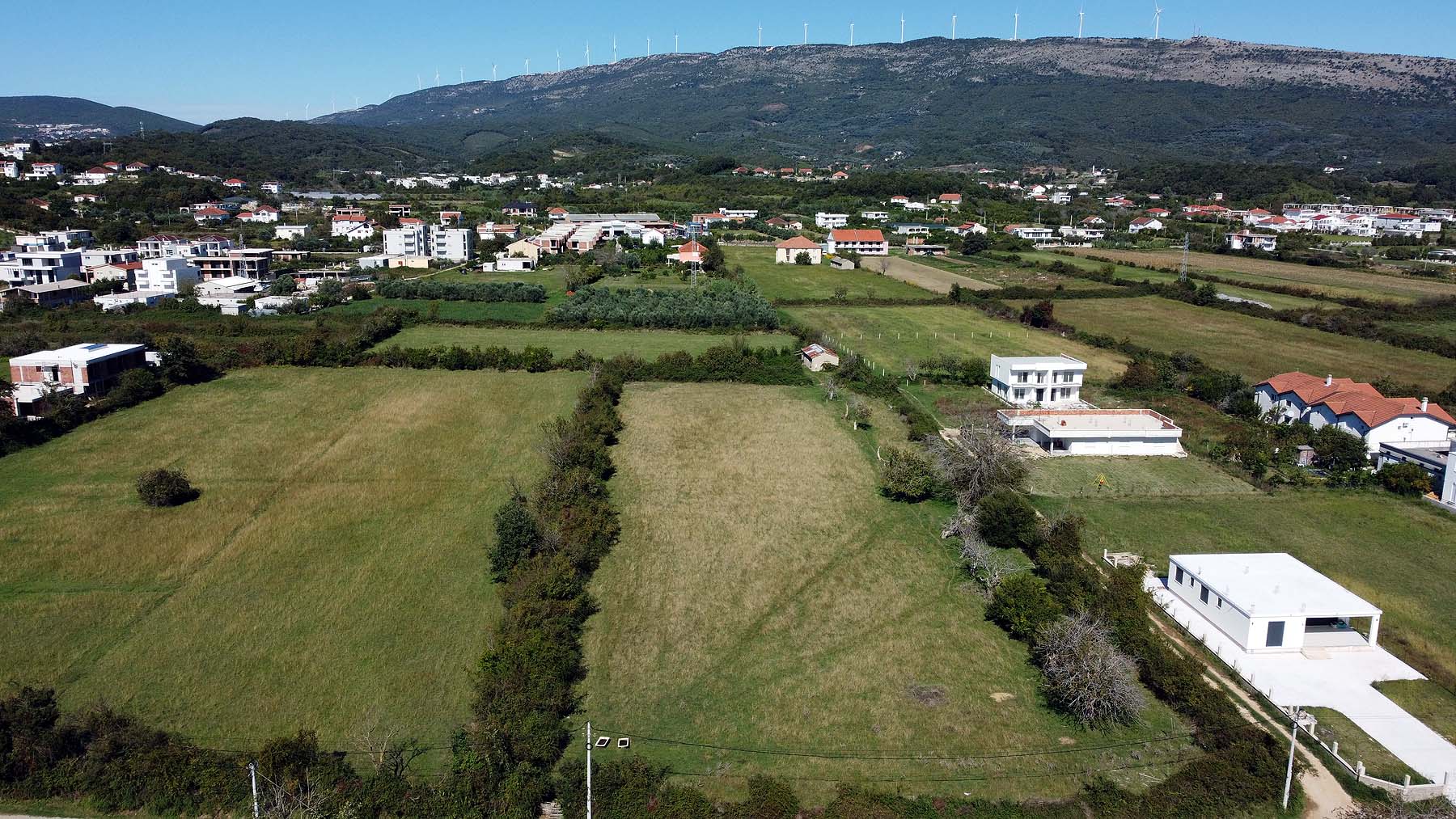Stunning aerial of Ulcinj, Montenegro&mdash;premium rural properties, fields, homes. Invest with montenegro-listings.me by ekosphere doo.