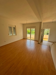 Bright, modern Ulcinj apartment with balcony, lush views, premium floors—exclusive to montenegro-listings.me by Ekosphere doo.