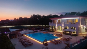 Stunning modern villa in Ulcinj, Montenegro—luxury pool, illuminated arches, balconies; exclusive at montenegro-listings.me by Ekosphere DOO.