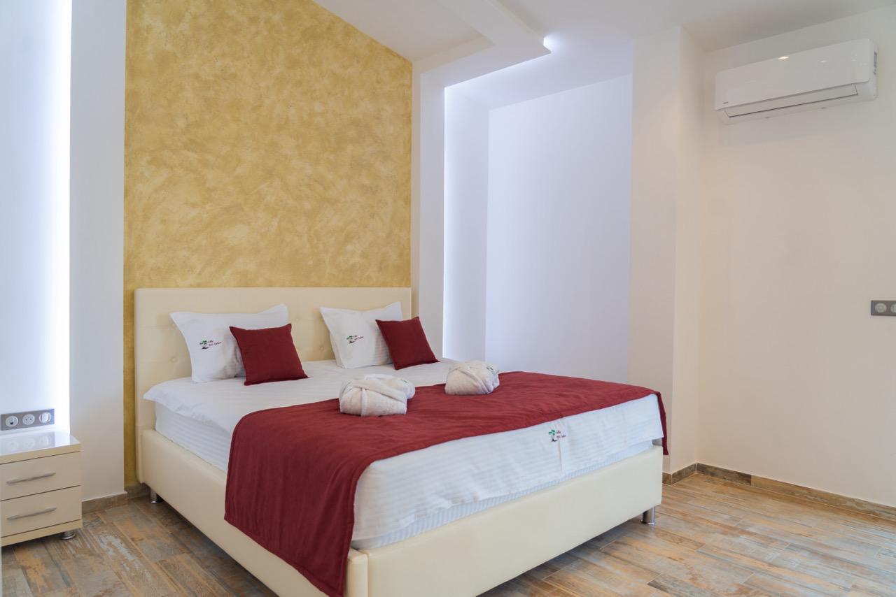 Bright Ulcinj property with wood floors, stylish bed, and modern decor&mdash;exclusive listing by montenegro-listings.me, Ekosphere doo.