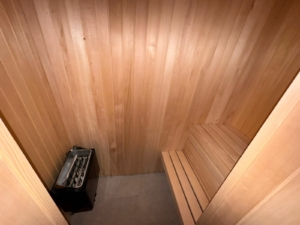 Modern light-wood sauna with bench and premium heater—exclusive wellness asset for Ulcinj real estate by montenegro-listings.me, Ekosphere DOO.