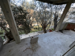 Under-construction balcony with scenic woodland views in Ulcinj, Montenegro—prime investment from ekosphere doo on montenegro-listings.me.