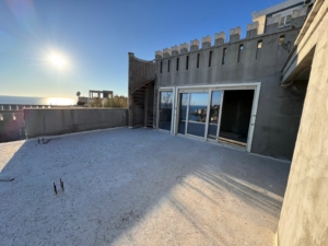 Spacious unfinished rooftop terrace with sea views in Ulcinj, Montenegro—prime investment property via montenegro-listings.me by ekosphere doo.