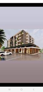 Discover a premium Ekosphere apartment building in Ulcinj, Montenegro—balconies, shops & palm-lined curb appeal. montenegro-listings.me.