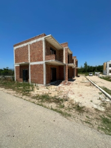Invest in Ulcinj: Two-story brick property under construction on prime land, listed on montenegro-listings.me by ekosphere doo.