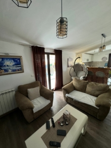 Modern Ulcinj apartment with stylish living room, sleek kitchen, designer decor—top investment on montenegro-listings.me by ekosphere doo.