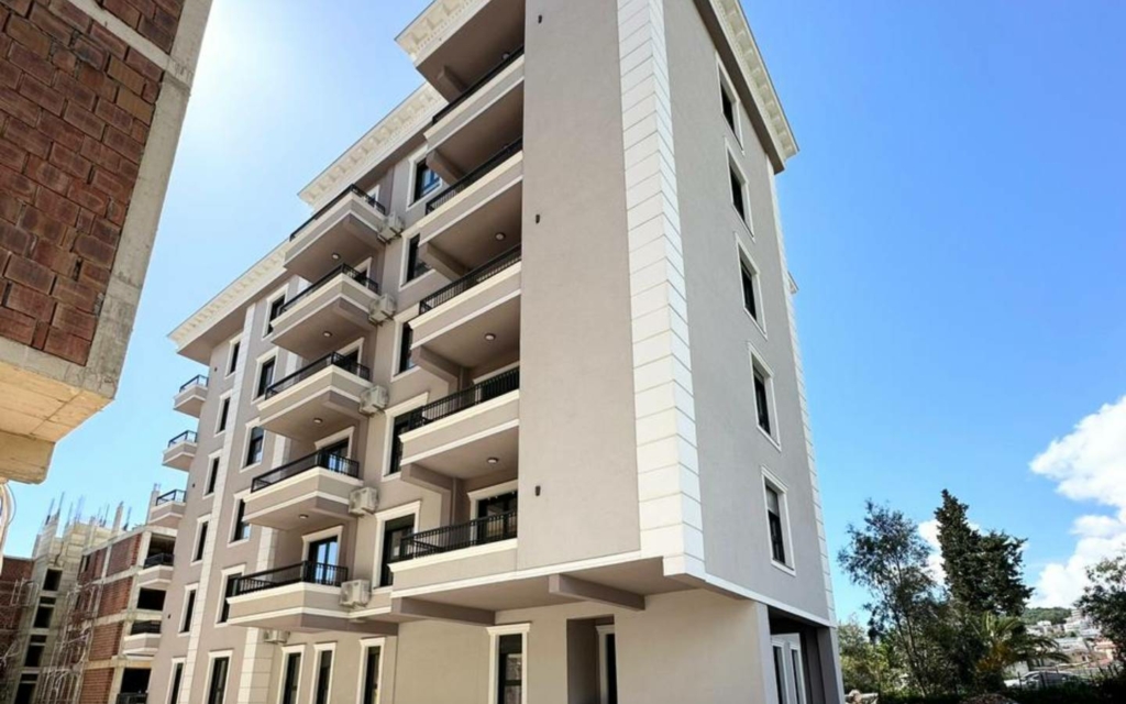 Premium multi-story apartment with balconies in Ulcinj, Montenegro—ideal investment, showcased by montenegro-listings.me (ekosphere doo).