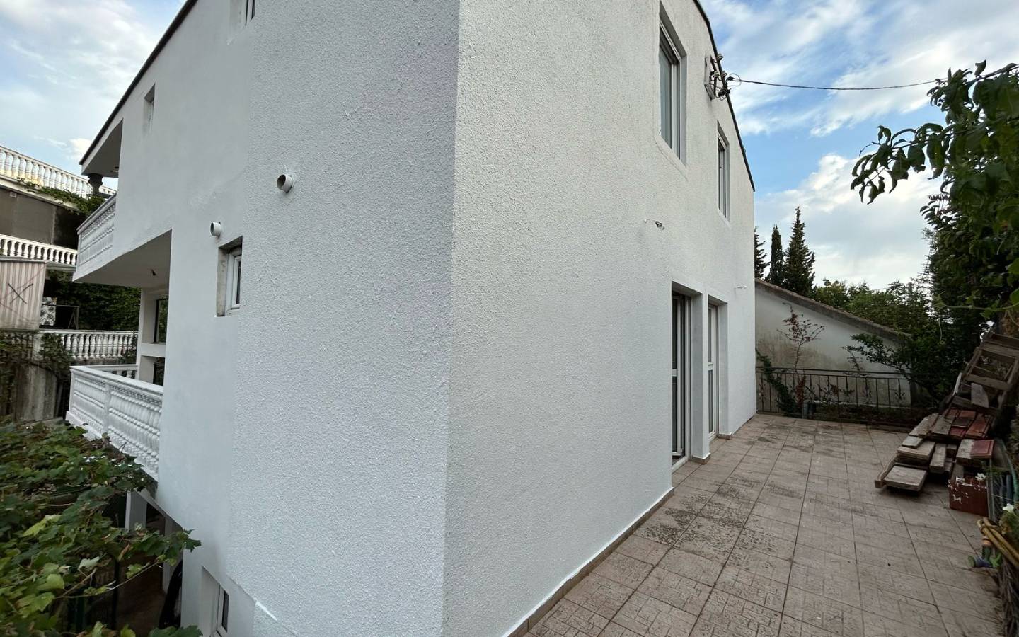 Modern two-story white property with patio in Ulcinj, Montenegro&mdash;ideal investment from montenegro-listings.me by ekosphere doo.