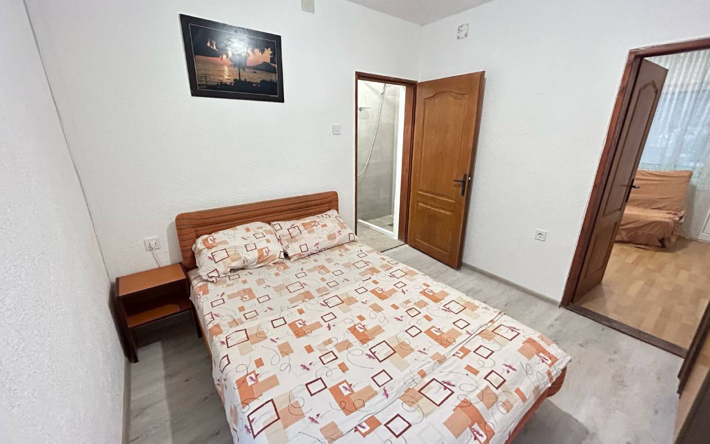 Modern small bedroom in Ekosphere, Ulcinj&mdash;double bed, stylish d&eacute;cor, ensuite access. Top Montenegro property at montenegro-listings.me.