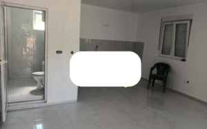 Elegant, minimalistic Ulcinj property with premium marble floors, glassed bathroom—exclusive listing at montenegro-listings.me by ekosphere doo.