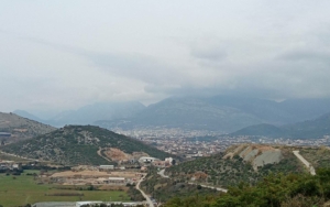 Panoramic view of Ulcinj’s prime properties amid hills, greenery, and urban growth—exclusive listings at Montenegro-listings.me by Ekosphere DOO.