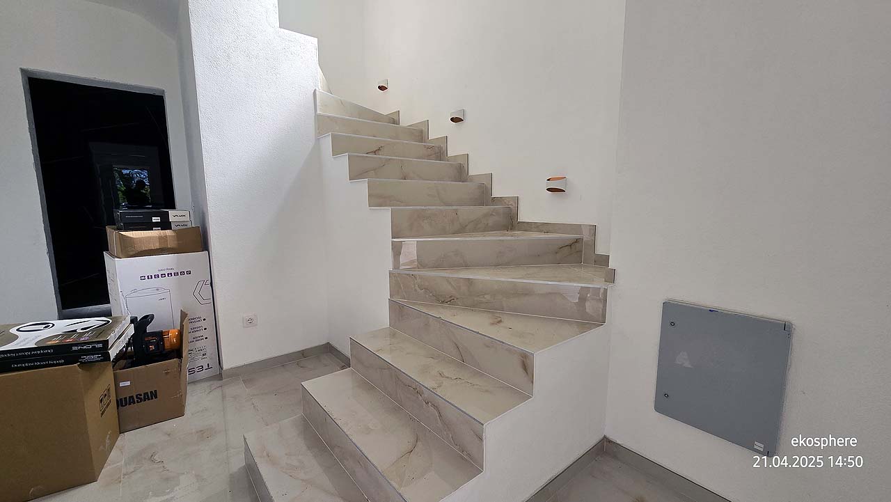 Elegant marble staircase with sleek, modern design&mdash;prime Ulcinj Montenegro property on montenegro-listings.me by ekosphere doo.