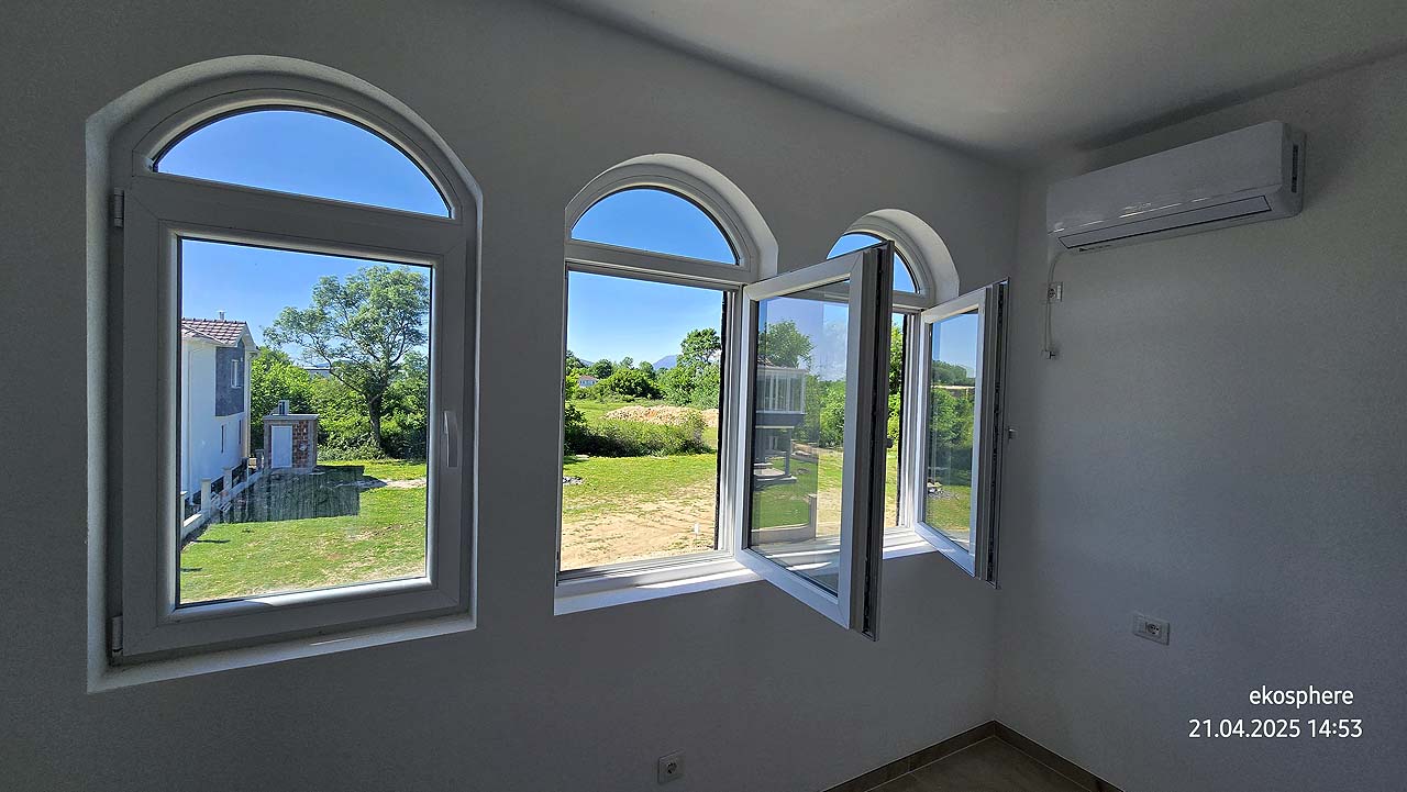 Bright Ulcinj room with 3 arched windows, AC, and garden view&mdash;prime investment on montenegro-listings.me by Ekosphere doo.