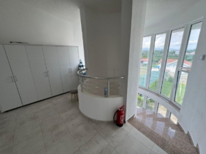 Spacious, light-filled Ulcinj room with white walls, modern wardrobe, and stylish staircase—premium Ekosphere DOO design at montenegro-listings.me.