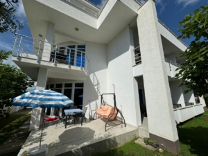 Stunning modern two-story house in Ulcinj with balconies, patio, and lush yard—exclusive at montenegro-listings.me by ekosphere doo.