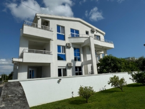 Modern 3-story building with balconies and large windows in Ulcinj. Prime real estate by ekosphere doo, montenegro-listings.me.