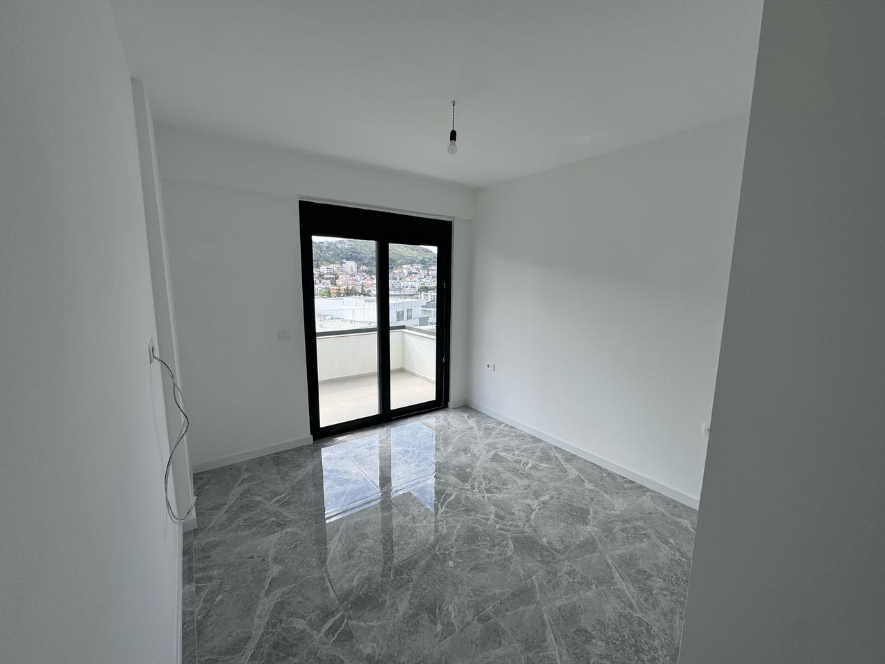 Modern Ulcinj apartment with city-view balcony, marble floors, and eco-friendly features&mdash;exclusively on montenegro-listings.me by Ekosphere doo.
