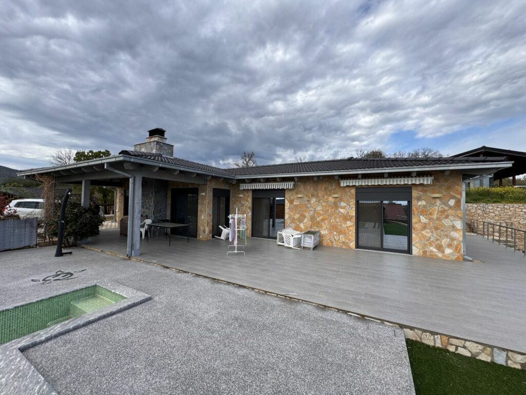 Stunning modern villa in Ulcinj, Montenegro&mdash;stone & stucco, elegant patio, tiled deck by pool. Exclusive at montenegro-listings.me by ekosphere doo.