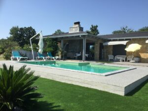 Luxury modern home in Ulcinj, Montenegro with pool, sun loungers, patio & lush yard. Invest via montenegro-listings.me by ekosphere doo.