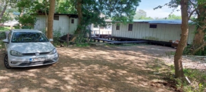 Spacious gravel lot in Ulcinj, Montenegro, near sought-after properties and a modern single-story building—ideal investment via montenegro-listings.me by ekosphere doo.