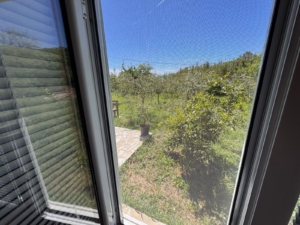 Stunning garden view from stone patio in Ulcinj, Montenegro. Exclusive Ekosphere listing on montenegro-listings.me—prime investment!.
