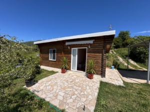 Discover your ideal Ulcinj getaway: a cozy wooden house amid lush greenery, offered by ekosphere doo on montenegro-listings.me.