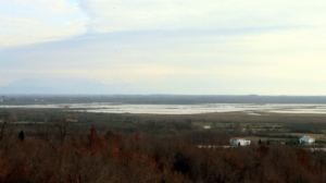 Prime Ulcinj, Montenegro land with panoramic wetlands, distant mountains, and development potential—exclusive on ekosphere doo’s montenegro-listings.me.