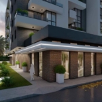Modern multi-story Ulcinj property featuring brick exterior, spacious balconies with greenery, and bright windows—exclusive at montenegro-listings.me by ekosphere doo.