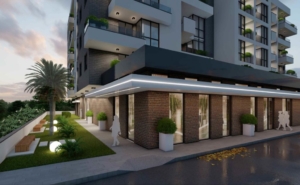 Modern multi-story Ulcinj property featuring brick exterior, spacious balconies with greenery, and bright windows—exclusive at montenegro-listings.me by ekosphere doo.