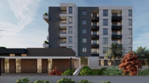 Contemporary Ulcinj apartment building with balconies, large windows, and lush greenery—exclusive property from montenegro-listings.me, a project by ekosphere doo.