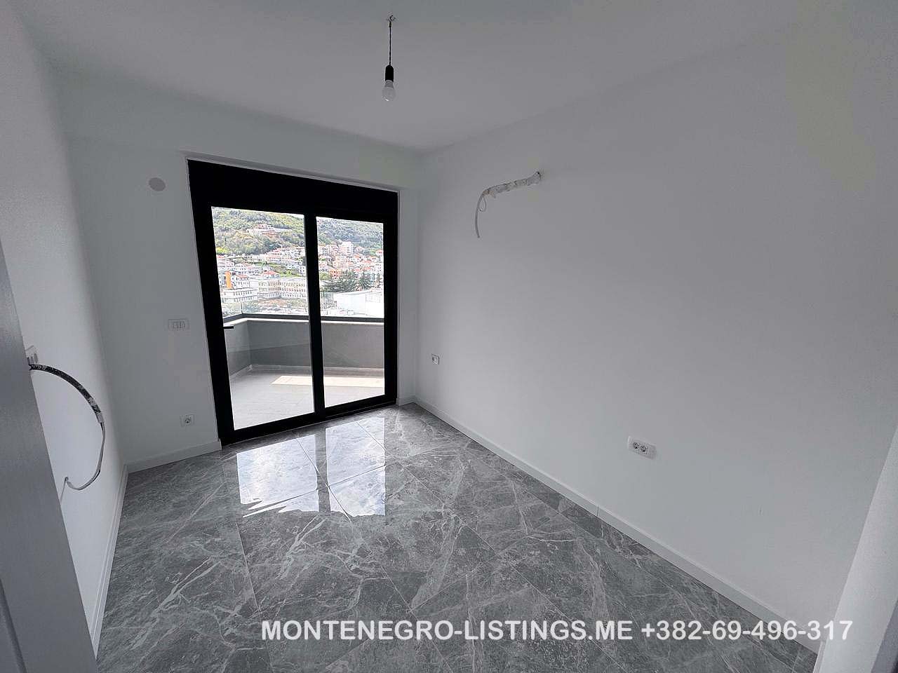 Spacious, sunlit room in Ulcinj with marble floors, balcony & hill views&mdash;rare Montenegro property. Visit montenegro-listings.me by ekosphere doo.