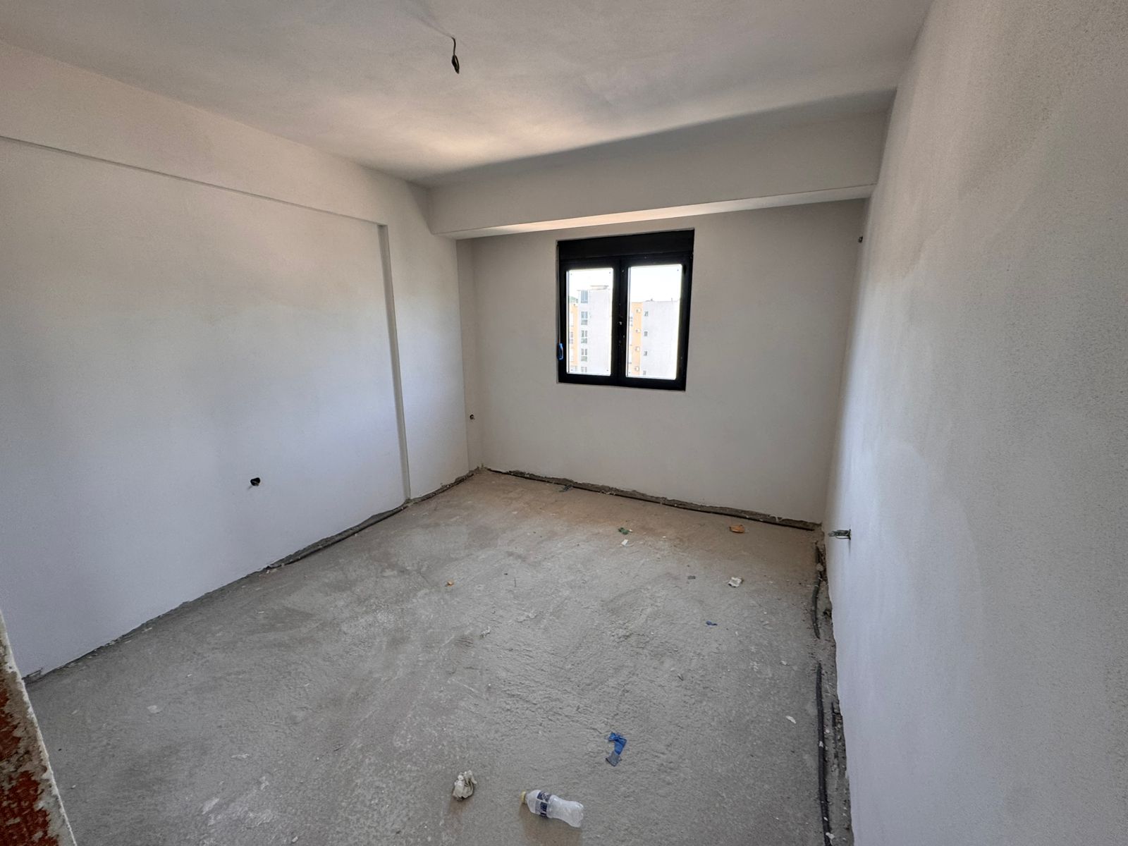 Spacious, unfinished room in Ulcinj, Montenegro with concrete floors&mdash;ideal for investors. Listed on montenegro-listings.me by Ekosphere Doo.