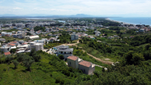 Invest in Ulcinj, Montenegro—luxury white homes set among hills, beach, and ocean views. Exclusively at montenegro-listings.me by ekosphere doo.