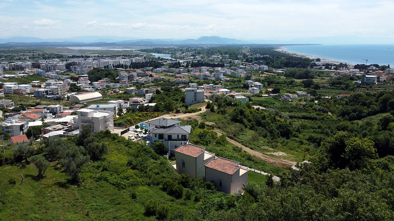 Invest in Ulcinj, Montenegro&mdash;luxury white homes set among hills, beach, and ocean views. Exclusively at montenegro-listings.me by ekosphere doo.