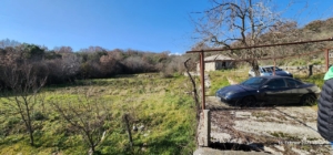 Prime Ulcinj Montenegro real estate: spacious grassy plot with panoramic hill views, ideal for investment. Ekosphere doo project.
