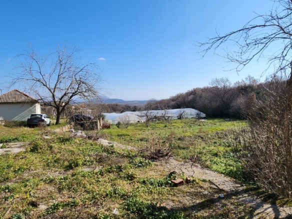 Investment opportunity in Ulcinj: house, car, greenhouses, scenic hills. Listed by ekosphere doo on montenegro-listings.me.