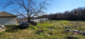Prime Ulcinj Montenegro land for sale: white building, greenhouse, car access—ideal investment. Exclusive on montenegro-listings.me by ekosphere doo.