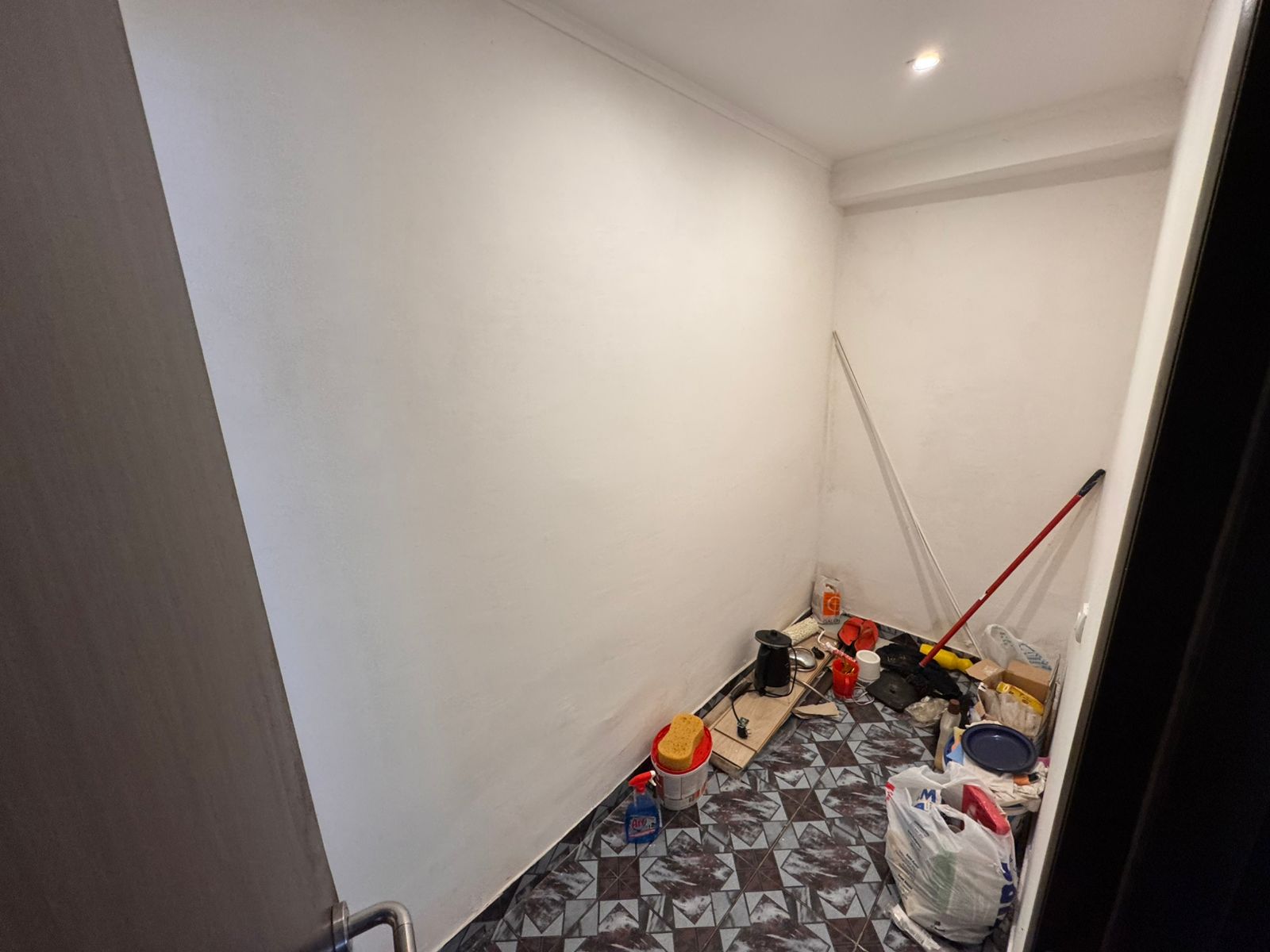 Modern small room for sale in Ulcinj, Montenegro&mdash;white walls, tile floors. Exclusive Ekosphere property at montenegro-listings.me.