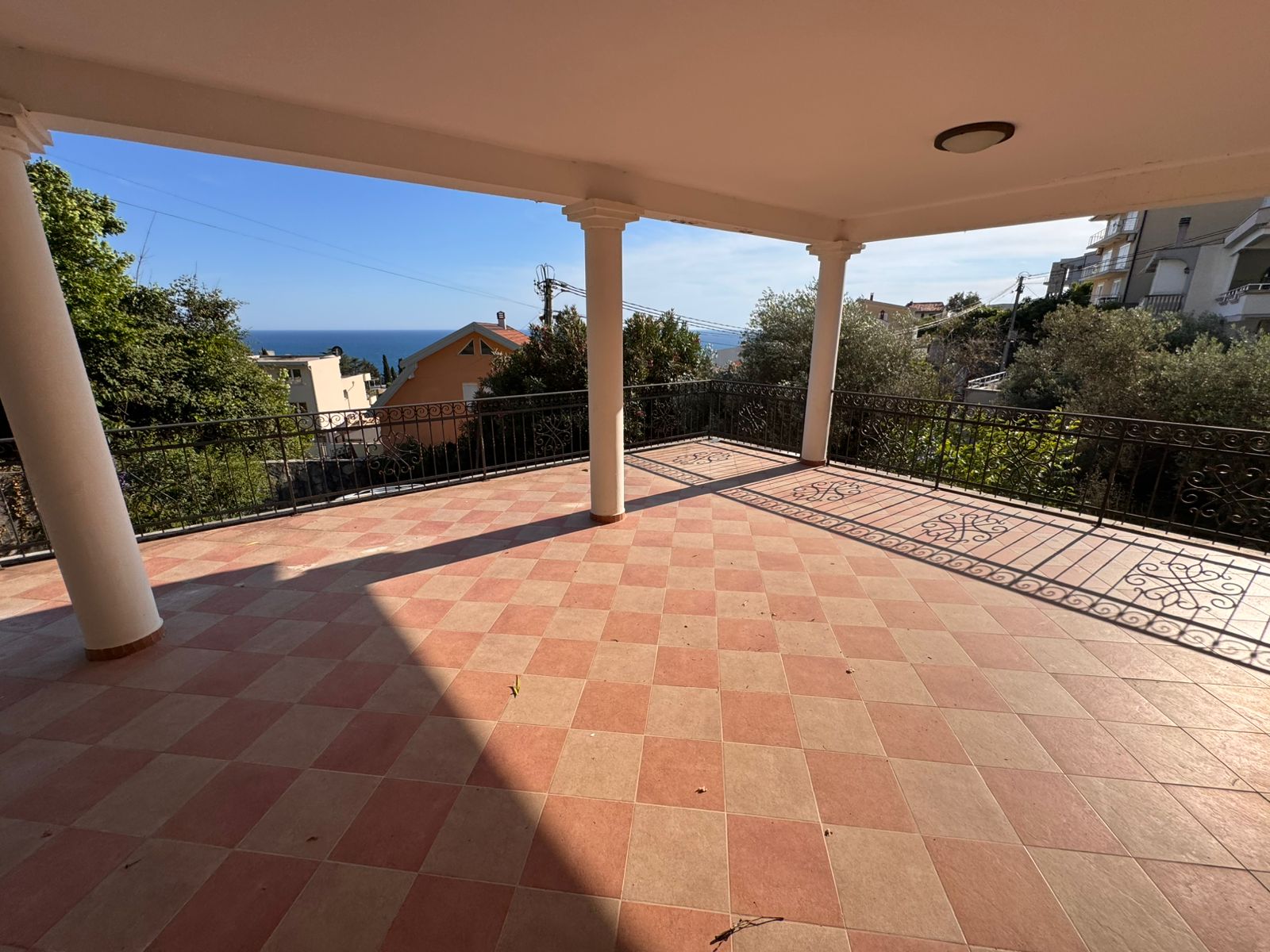 Elegant covered terrace with sea and city views in Ulcinj. Exclusive real estate investment on montenegro-listings.me by ekosphere doo.