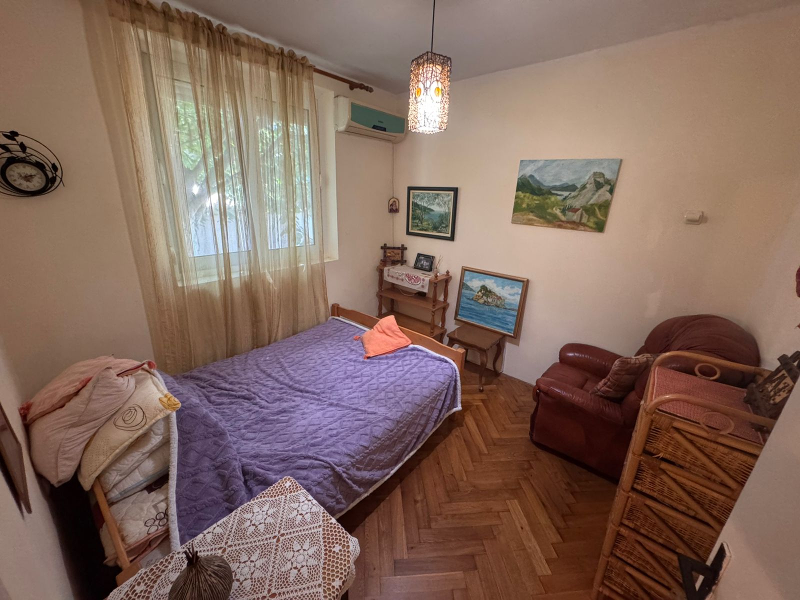 Charming Ulcinj bedroom with a single bed, quality wood furniture, airy curtains&mdash;ideal Montenegro investment at montenegro-listings.me by ekosphere doo.