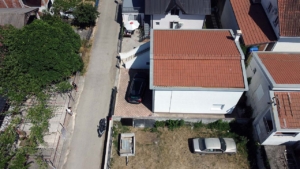 Prime Ulcinj real estate: homes with red-tiled roofs, patios, and private parking—exclusive listings on montenegro-listings.me by ekosphere doo.