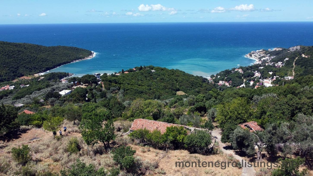Discover prime Ulcinj, Montenegro real estate—forested hills, red-roof homes, sandy beaches & investment on montenegro-listings.me by ekosphere doo.