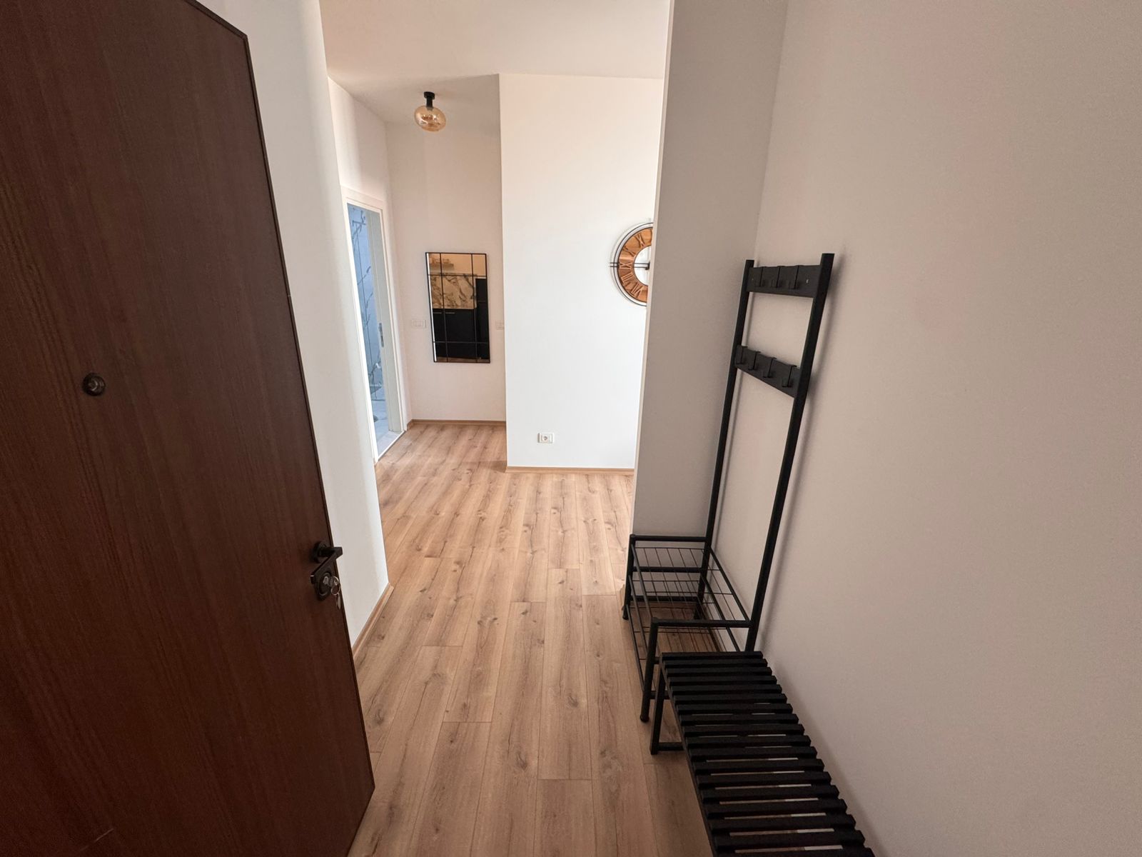 Bright hallway in Ulcinj property with light wood floors, modern accents; exclusive listing by montenegro-listings.me, ekosphere doo.