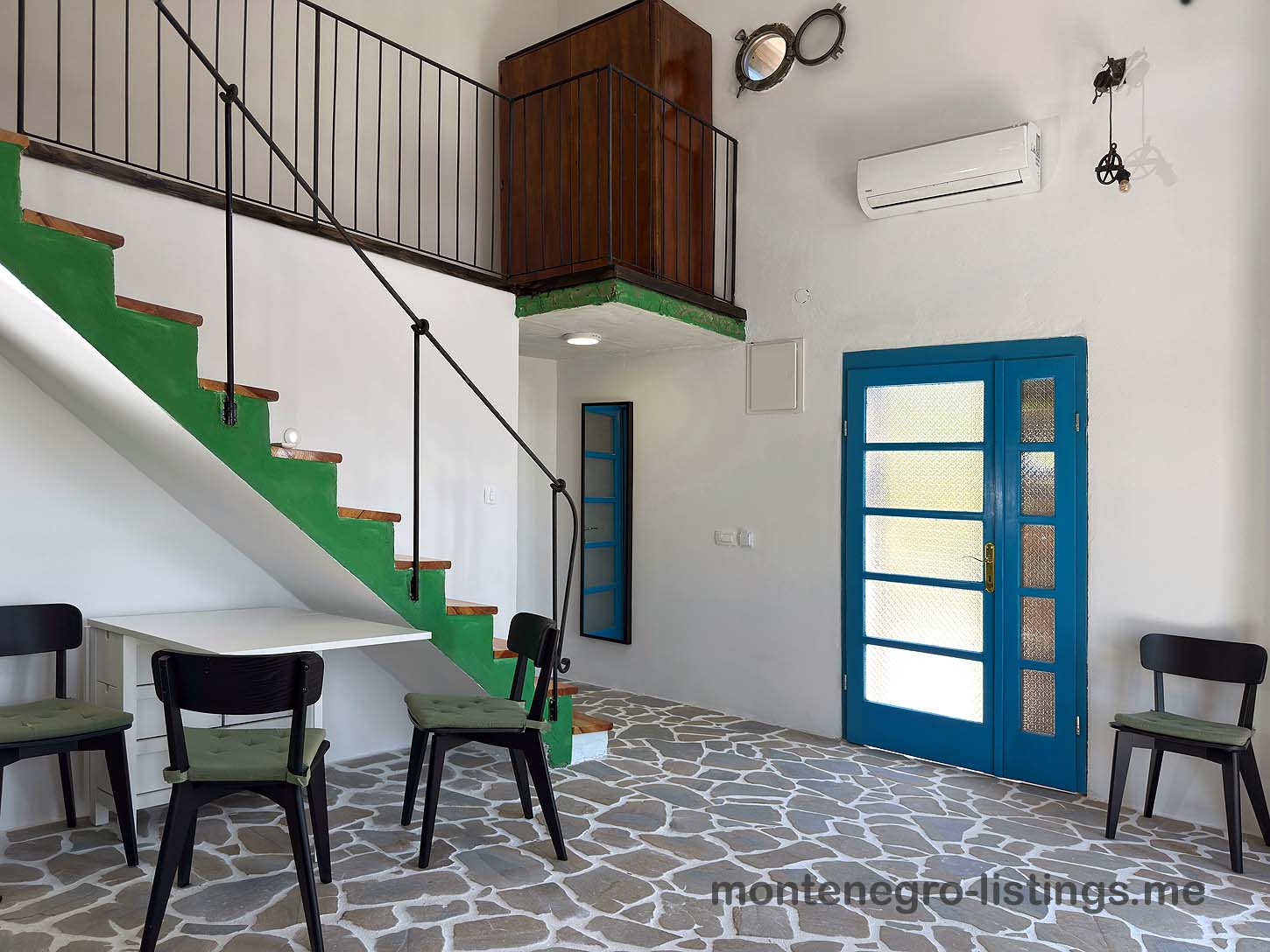 Stunning Ulcinj property: airy interior, modern green-white staircase, stone floors, loft, AC&mdash;listed by ekosphere doo on montenegro-listings.me.
